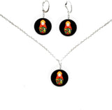 Handcrafted Russian matryoshka Slavic doll dangle cabochon earring and necklace set in silver with black background and red strawberries
